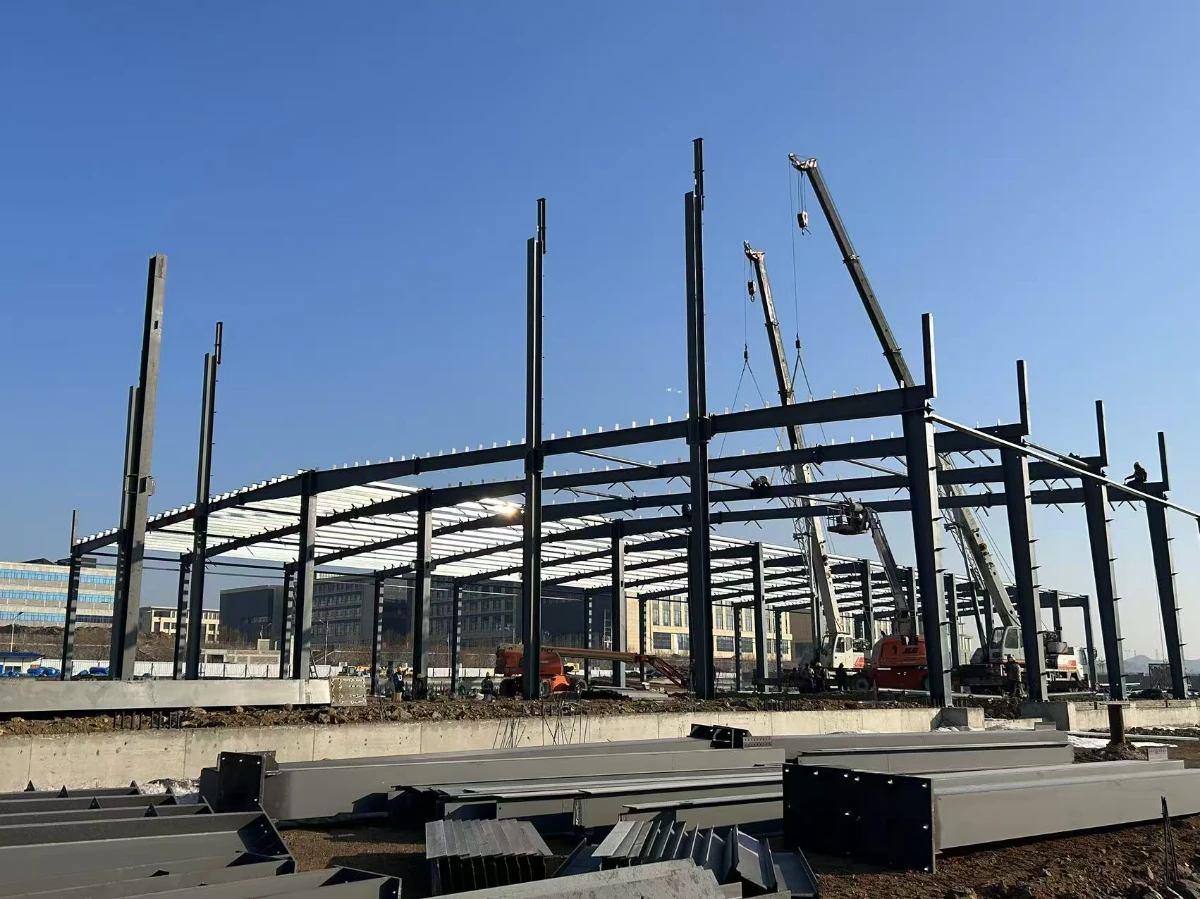 Factory-made prefabricated steel structure components staged on a construction site