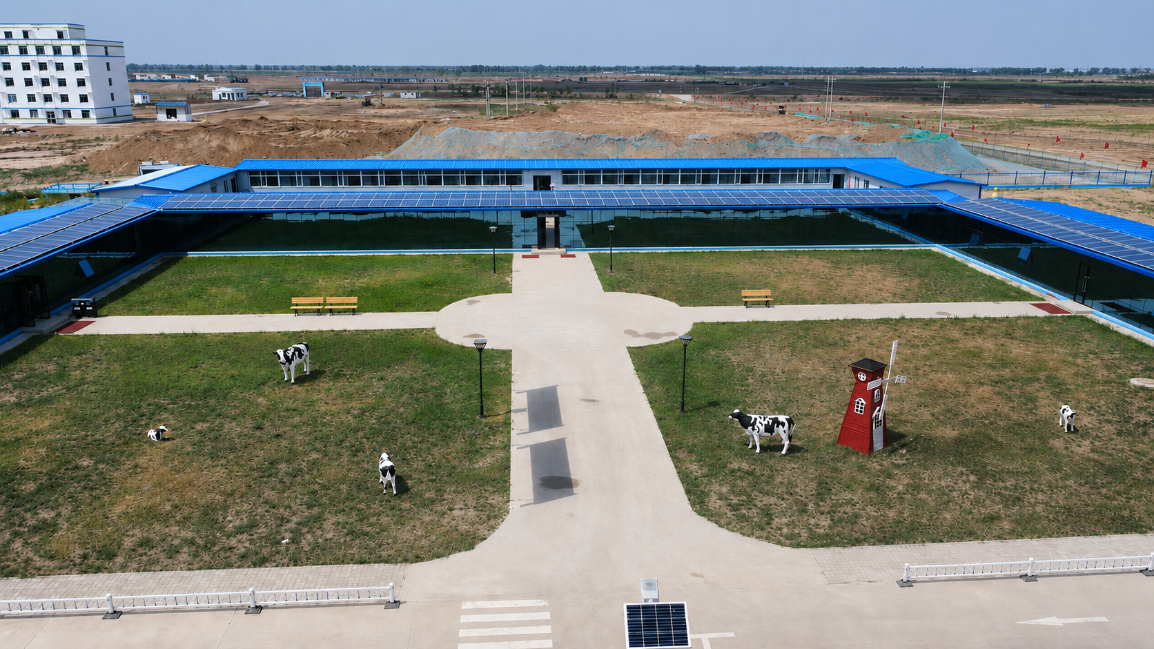 Entrance, office and welcome area at a turnkey livestock farm with rooftop solar